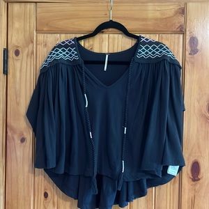 Free people too. Cape like style.